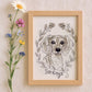 Framed watercolor illustration of a dog with floral elements and the word 'Darling' on a beige wall.